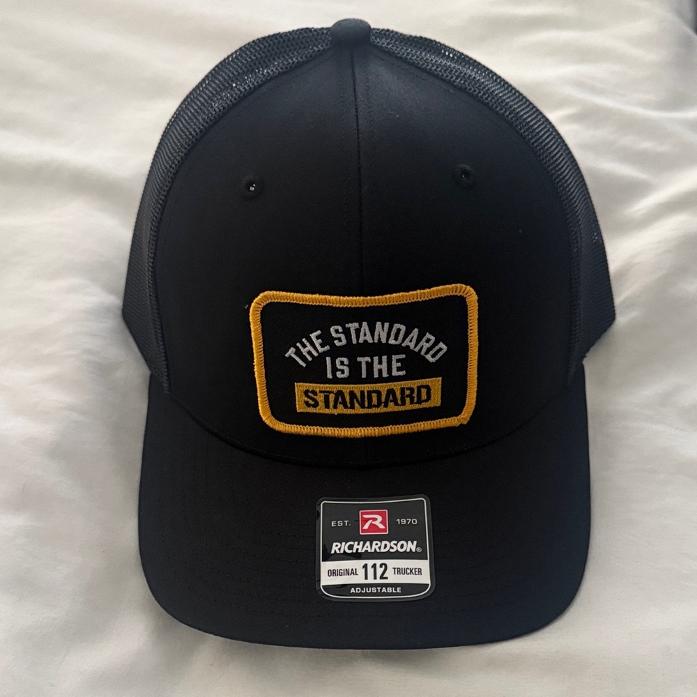 Coach T Black Trucker Hat - "The Standard is the Standard"